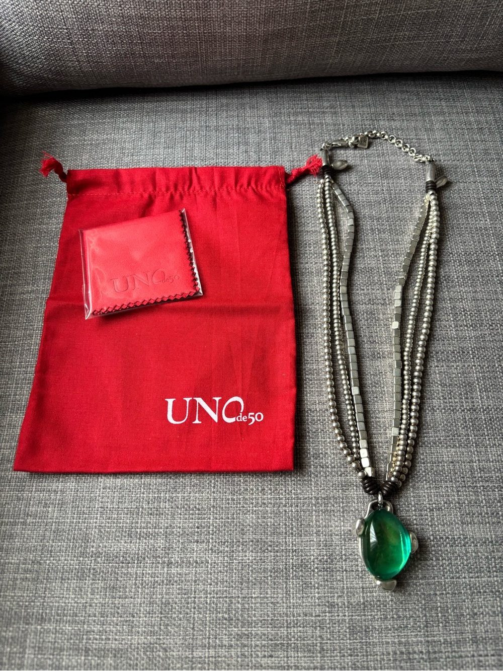 Uno de 50 multi chain necklace with green stone 20” drop Adjustable